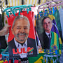 Brazilian presidential candidates Luiz Inacio da Silva, left, and Brazilian President Jair Bolsonaro