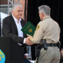 Nevada Gov. Steve Sisolak, left, and Clark County Sheriff Joe Lombardo