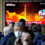 A TV screen shows a file image of North Korea's missile launch during a news program at the Seoul Railway Station in Seoul, South Korea, Friday, Oct. 14, 2022. North Korea early Friday launched a short-range ballistic missile toward its eastern waters and flew warplanes near the border with South Korea, further raising animosities triggered by the North's recent barrage of weapons tests. (AP Photo/Ahn Young-joon)