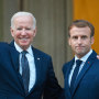 French President Emmanuel Macron welcomes US President Joe Biden (L) before their meeting at the French Embassy to the Vatican in Rome on October 29, 2021.