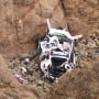 Aerial view of a Tesla that plunged over a cliff in San Mateo County. 