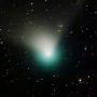 Comet C/2022 E3 (ZTF)'s brighter greenish coma, short broad dust tail and long faint ion tail on Dec. 25.