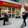 People walk past a Wells Fargo branch in New York