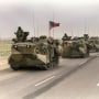 A convoy of U.S. Army tanks driving down the road from Kuwait towards Dhahran in the Saudi desert as U.S. troops begin their withdrawal from Kuwait on March 5, 1991.