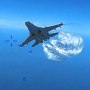 Two Russian Su-27 aircraft  intercept with a U.S. Air Force intelligence, surveillance, and reconnaissance unmanned MQ-9 aircraft operating within international airspace over the Black Sea on March 14, 2023.