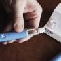 A person prepares a semaglutide  injection