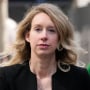 Former Theranos CEO Elizabeth Holmes leaves federal court in San Jose, Calif., Friday, March 17, 2023. 