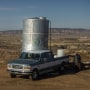 Marilyn Help-Hood hauls water  in Tohlakai, N.M.