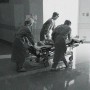Doctors pushing patient to surgent room