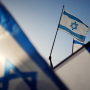 Israel's rival political factions have agreed to begin negotiations after Netanyahu paused a controversial judicial overhaul plan that had triggered unprecedented street protests and a spiraling domestic crisis.