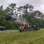 A car launches off a tow truck ramp in Lowndes County, Ga.