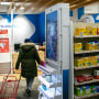 A person walks through a pharmacy in New York