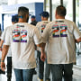 Attendees wearing special LGBTQ+ Pride Night commemorative shirts at Dodger Stadium in Los Angeles
