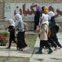 Girls leave their school for the day in Kabul, Afghanistan, on June 5, 2023.