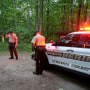 Authorities secure the entrance to Mine Bank Trail, an access point to the rescue operation along the Blue Ridge Parkway where a Cessna Citation crashed over mountainous terrain near Montebello, Va., on June 4, 2023. 