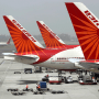 FILE - Air India aircrafts stand at Indira Gandhi International Airport in New Delhi, India, April 29, 2011.  An Air India plane flying from New Delhi to San Francisco landed in Russia after it developed an engine problem, officials said on Wednesday, June 7, 2023. The plane, carrying 216 passengers and 16 crew members, landed safely at Russia’s Magadan airport in the country’s far east on Tuesday, Air India said in a statement.