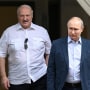 Vladimir Putin, right, and  Alexander Lukashenko during their meeting at the Bocharov Ruchei residence in Sochi, Russia