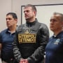 Peruvian police and Interpol agents handing over Joran Van der Sloot to FBI agents for a temporary extradition to the United States in Callao, Peru