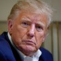 Former President Donald Trump  speaks with reporters on his plane after a campaign rally in Waco, Texas, on March 25, 2023. 