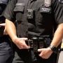 A Los Angeles police officer wears a body camera outside of City Hall in Los Angeles on May 1, 2020.