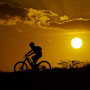 A person rides their bike in San Antonio during a heat wave