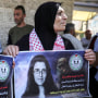 A rally outside the International Committee of the Red Cross office in Gaza City in July demanding the Iraqi government  include Palestinian prisoners in Israeli jails in the exchange for Israeli-Russian academic Elizabeth Tsurkov.