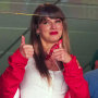 Taylor Swift reacts during a football game