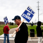 United Auto Workers members and supporters on a picket line outside the General Motors Co. plant in Swartz Creek, Mich., on Sept. 25, 2023.
