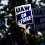 UAW members walk the picket line in front of the Chrysler Corporate Parts Division in Ontario, Calif., on Sept. 26, 2023.