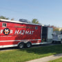 Emergency responders set up a staging area near Teutopolis, Illinois, High School on Saturday,.