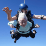Dorothy Hoffner, 104, falling through the air with tandem jumper Derek Baxter