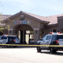 A toddler in Las Vegas is in critical but stable condition after finding and firing a weapon that was apparently dropped by a suspect as he climbed over a wall at a daycare center while fleeing another shooting scene. 