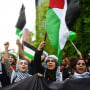 Members of the Palestinian community in Chile protest outside the Israeli Embassy against military operations in Gaza on Oct. 19, 2023, in Santiago.