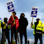 Factory workers and UAW union members form a picket line outside the Ford Motor Co. Kentucky Truck Plant in the early morning hours, in Louisville, Kentucky. 