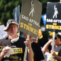 SAG-AFTRA members and supporters picket outside Paramount Studios in Los Angele
