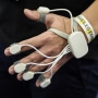 A Palmplug multi-sensory wearable device