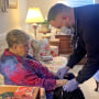 Manny Mill, right, a community paramedic, helping Florence Sparks, 80, of Pineville, NC, with an IV. 