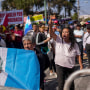 Supporters of Guatemalan President-elect Bernardo Arévalo protest a delay in the start of the legislative session to swear-in new lawmakers on Arévalo's inauguration Day, outside Congress in Guatemala City, Sunday, Jan. 14, 2024.
