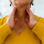 Woman with sore throat