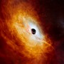 This illustration provided by the European Southern Observatory in February 2024, depicts the record-breaking quasar J059-4351, the bright core of a distant galaxy that is powered by a supermassive black hole. The supermassive black hole, seen here pulling in surrounding matter, has a mass 17 billion times that of the Sun and is growing in mass by the equivalent of another Sun per day, making it the fastest-growing black hole ever known. 