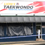 Police investigate a crime scene at Lion's Taekwondo Martial Arts Academy in Sydney on Feb. 21, 2024.