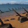 Anti-landing barricades are pictured on the beach, with China's Xiamen city in the background, in Kinmen