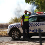 Police are seen during a spot fire outside of Beaufort, Victoria, Wednesday, February 28, 2024. 