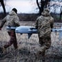 Ukrainian soldiers prepare a drone at the frontline near Bakhmut, in Ukraine's Donetsk region on March 26, 2024. 