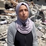 Siraj al-Najjar, 19, searches through the rubble of homes in Khan Younis looking for the remains of relatives.