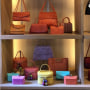 Handbags designed by Nancy Gonzalez displayed in the Gzuniga Ltd. showroom.