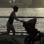 A woman pushes a stroller in New York City, on Nov. 6, 2022.
