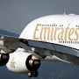 Emirates airplane in the sky.