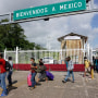 Migrants cross through the Mexico-Guatemala border