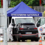 A forensic investigator at the site of a ramming attack in France
